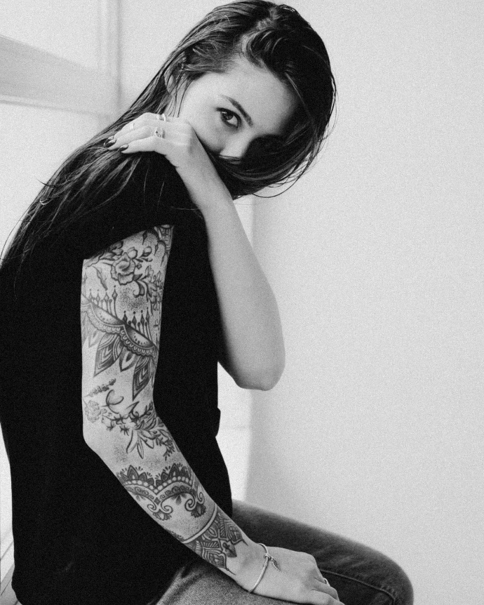woman in black sleeveless top